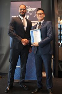 Navreet Virdi accepts his award from GHD